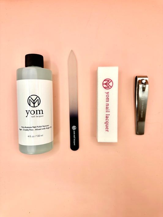 Our Manicure set comes with glass file, nail buffer, nail clipper, & non-acetone argan oil infused polish remover.